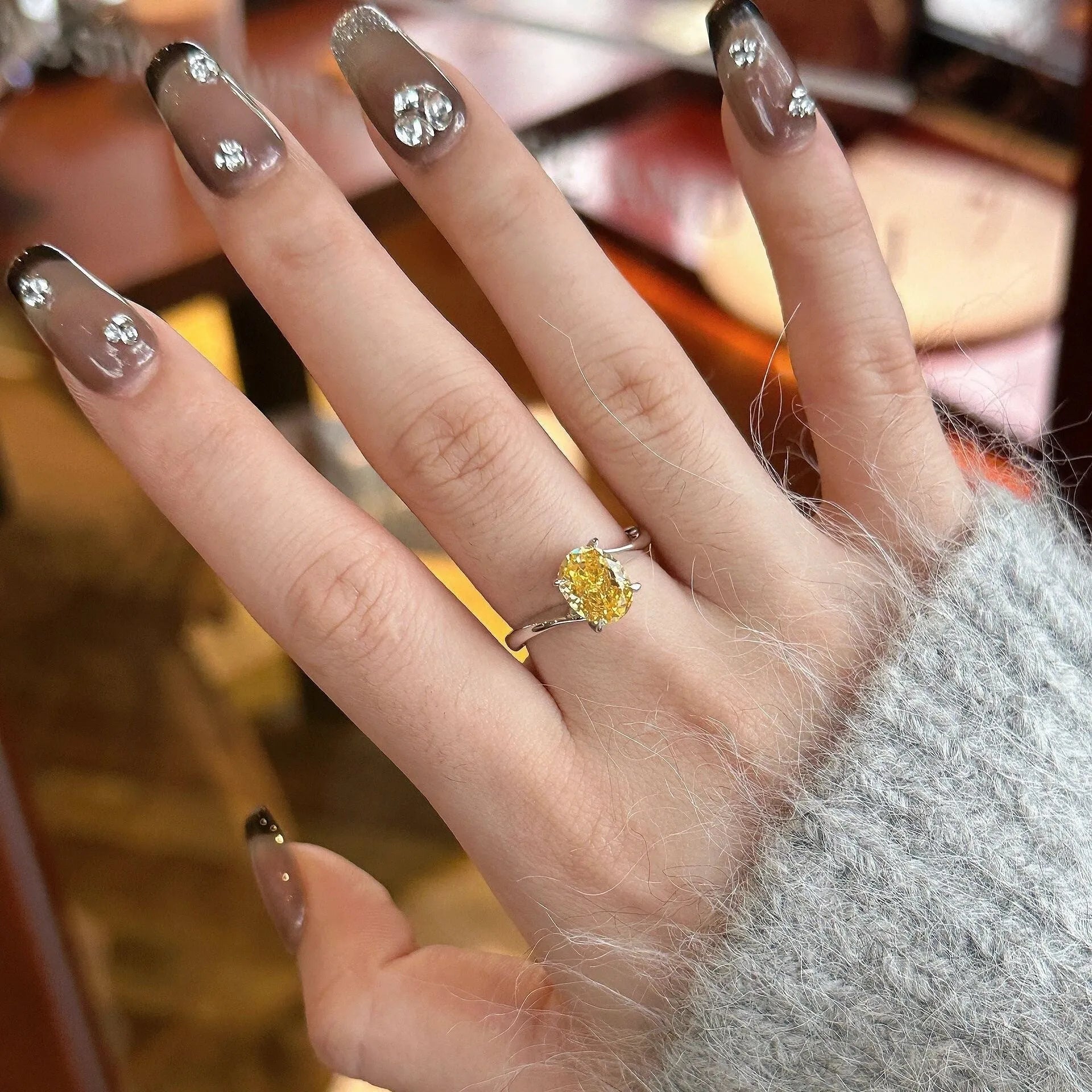 Women's yellow rock sugar fashion ring made from copper with Seiko treatment