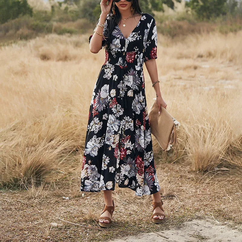 Women's floral print summer dress with V-neck, short sleeves, elastic high waist, and large hemline midi skirt