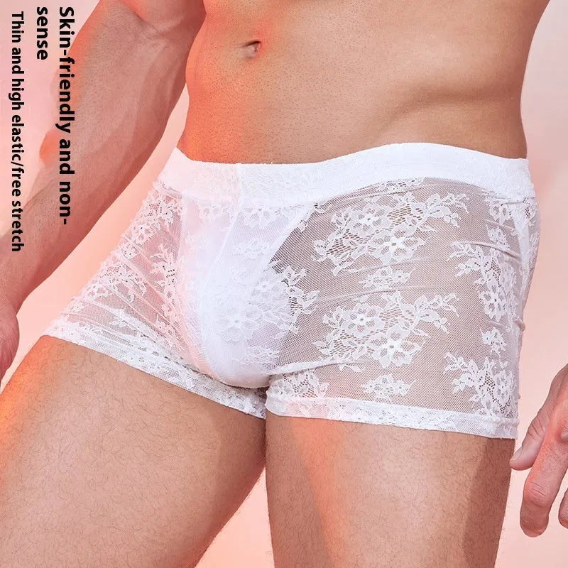 Men's lace-trimmed boxers in black, white, or red, made from nylon fabric, free size with 2-3cm tolerance.