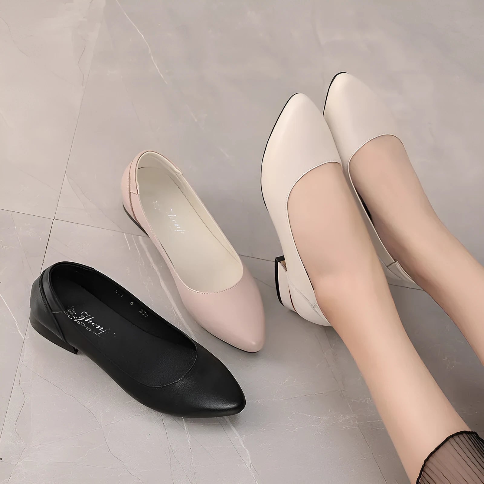 Beige pointed-toe casual shoes with a buckle fastening and flat rubber sole.