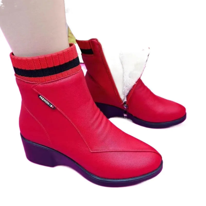 Pair of women's mid heel square heel ankle boots with side zipper and artificial plush lining in black or red