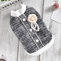 Black PU sausage dog style jacket on a small cat.