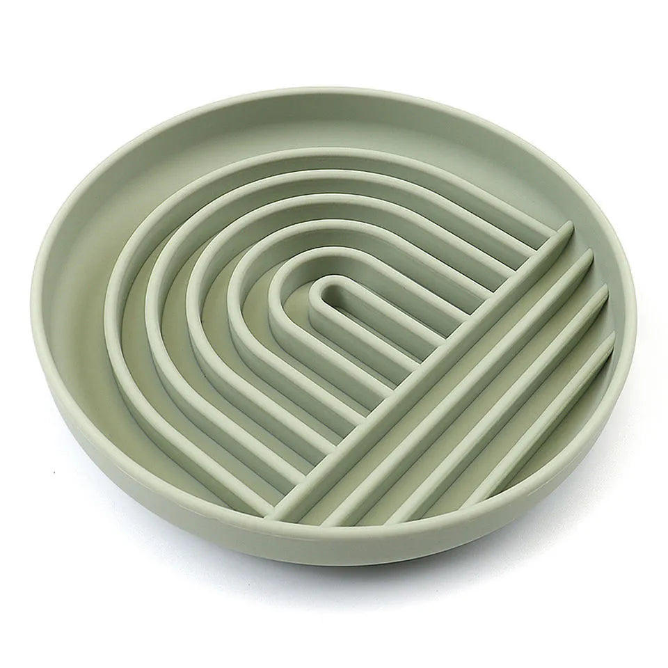 Silicone slow feeder bowl for dogs with ridges and nooks, available in beige, charcoal ash, gray blue, mango yellow, mustard green, or red.