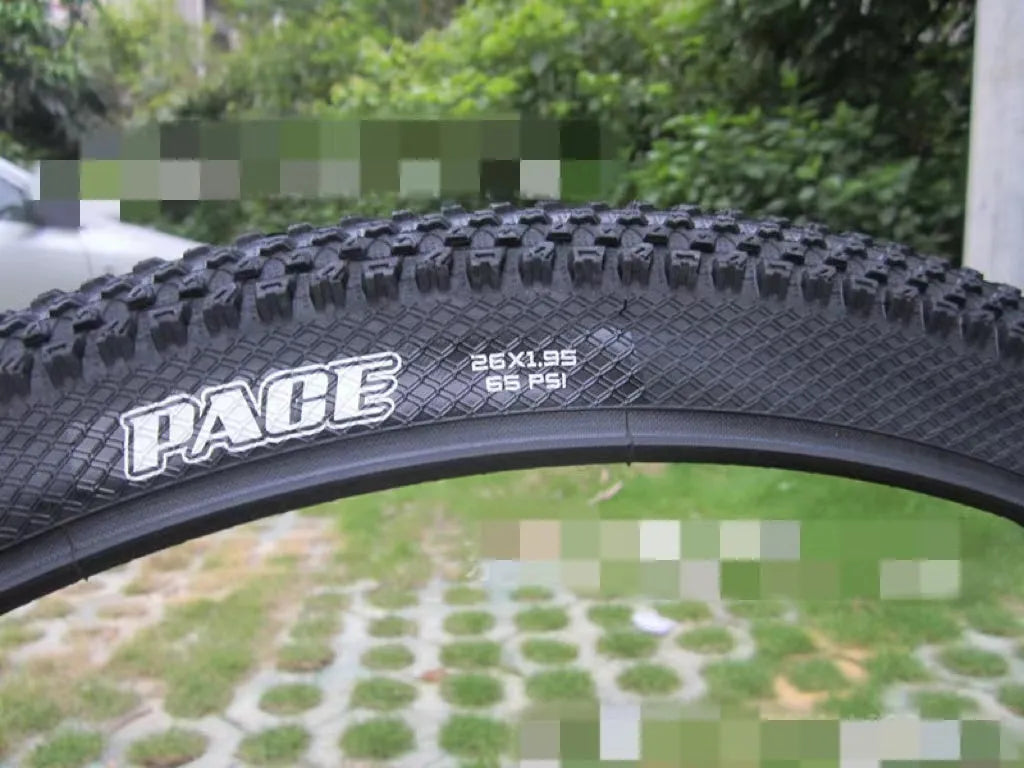 Mountain bike tyre showing tread pattern and sidewall with size markings