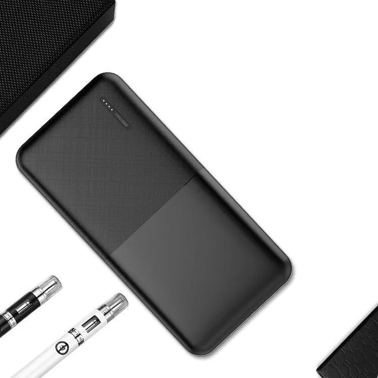 Black and white 20000 mAh power bank showing front view with USB ports