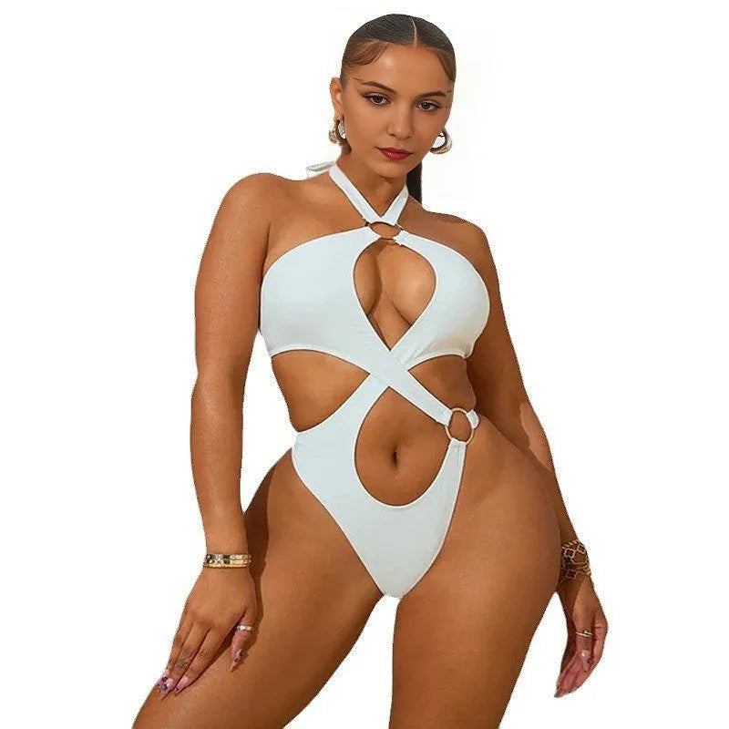 Women's white sleeveless jumpsuit with back lace-up detail and tapered short pants