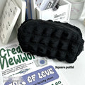Beige fabric pencil case with soft puffy design and zip closure, measuring 20cm by 8cm