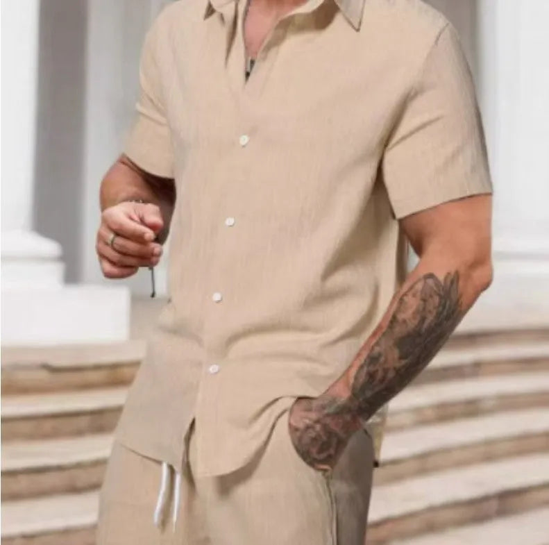 Men's striped printed casual suit set featuring a short sleeve shirt and matching shorts on a hanger.