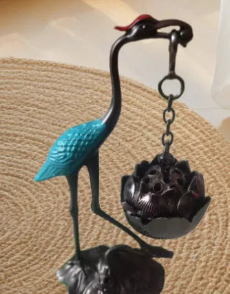 Chinese style gourd-shaped incense coil burner in copper alloy with dragon and phoenix design, painted blue or red top.