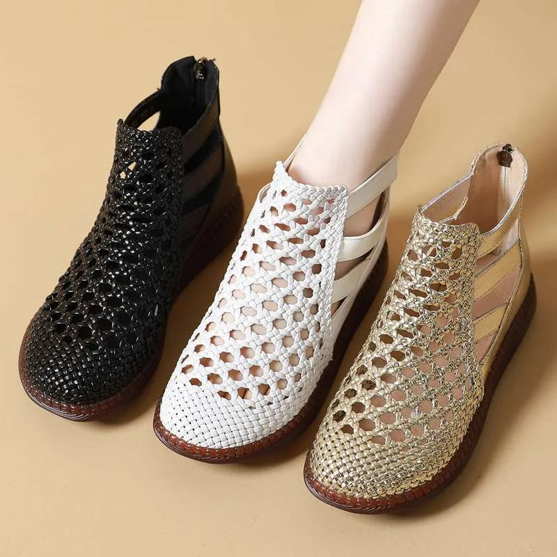 Women's flat sandals with hollow-out design in gold colour showing soft TPR soles and oversleeve style