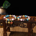 Handmade ancient fluorescent glaze bracelet with swallowing gold beast design on 10mm heart-shaped beads