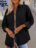 Women's black solid colour long-sleeved polyester knitted cardigan with contrast trim.