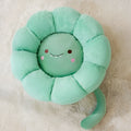 Soft yellow sunflower patterned pet nest cushion for cats and small dogs on a wooden floor.