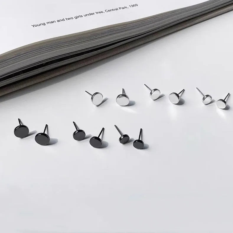 S999 sterling silver flat round ear studs in silver and black colours showing 3mm to 8mm size options