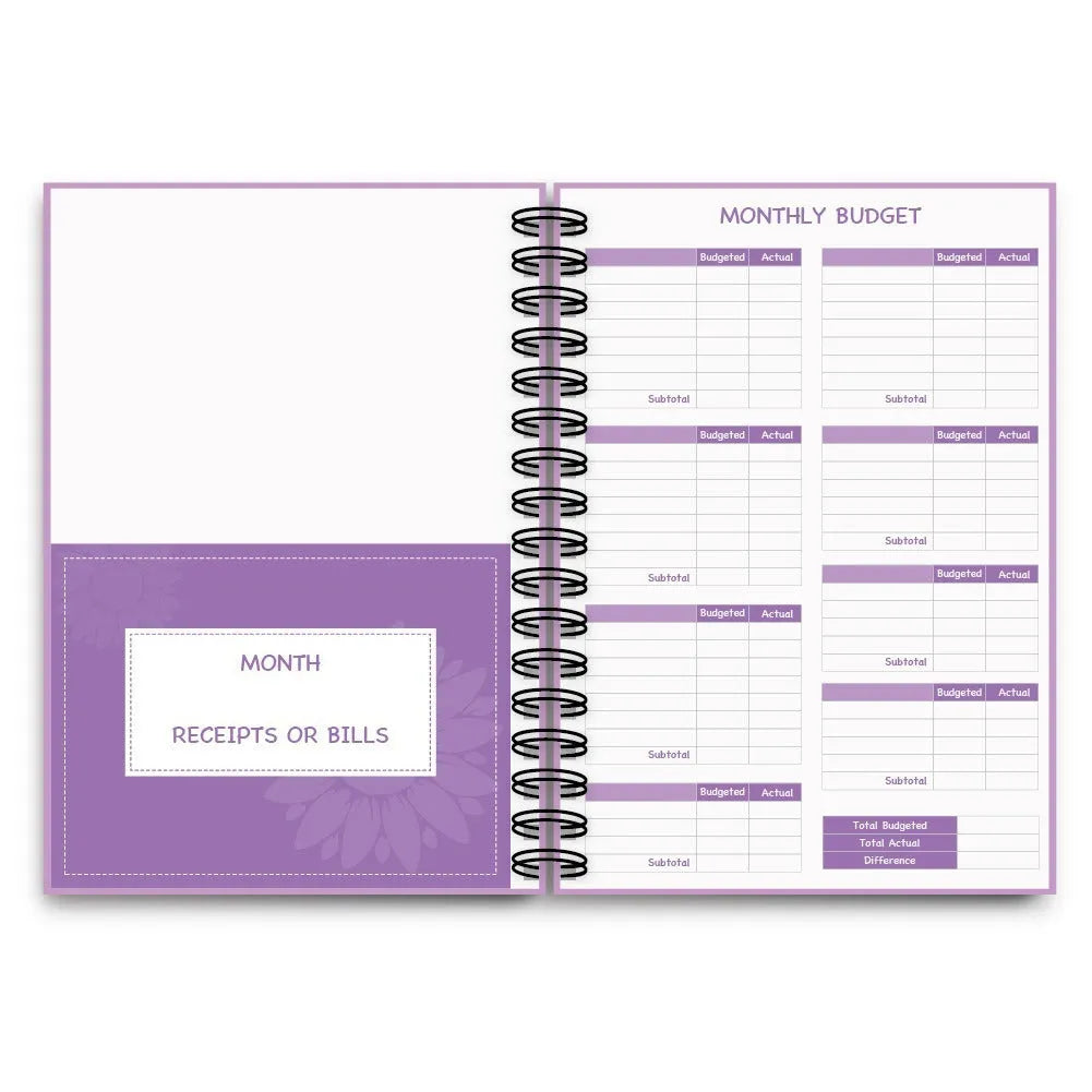 Purple coil-bound financial planning notebook open on a monthly budget page with pen and stickers.