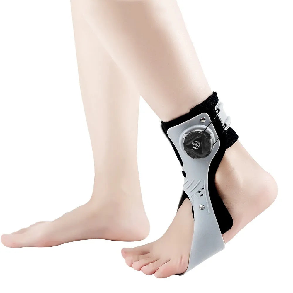 Airbag button ankle support brace in grey colour showing adjustable compression system and ankle fixation design