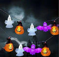 Halloween LED string lights with pumpkin, ghost and bat shaped covers, battery operated, PVC shell, warm white.