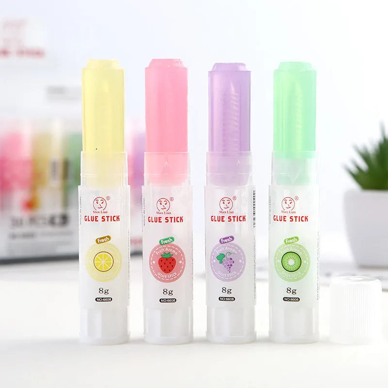 Jelly solid glue stick with fruit fragrance measuring 8.5cm long for craft and school projects
