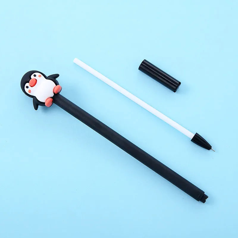 Korean cartoon penguin design gel pen with silicone grip in black or blue, showing 0.5mm tip.