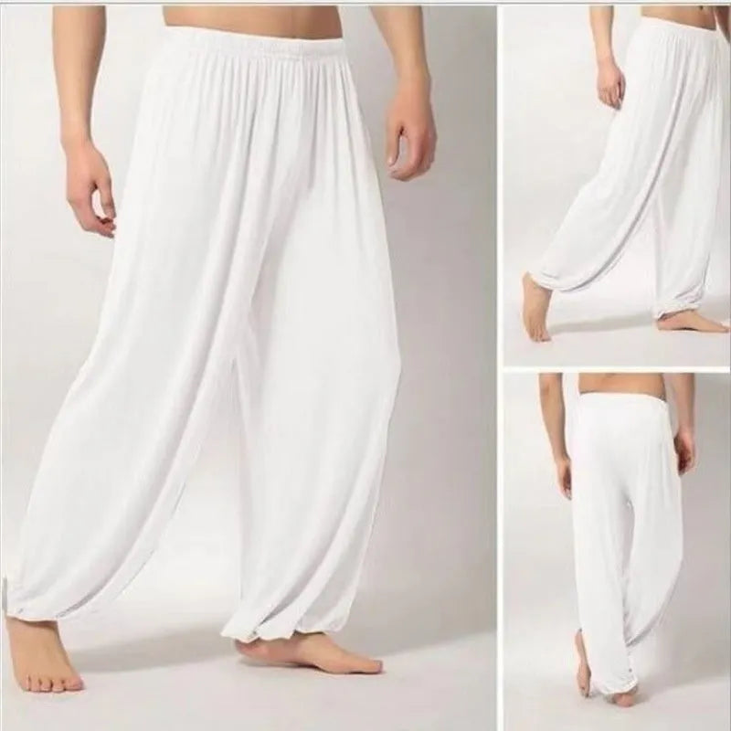 Black children's high-elasticity Lycra practice pants for Sanda martial arts training on a white background.