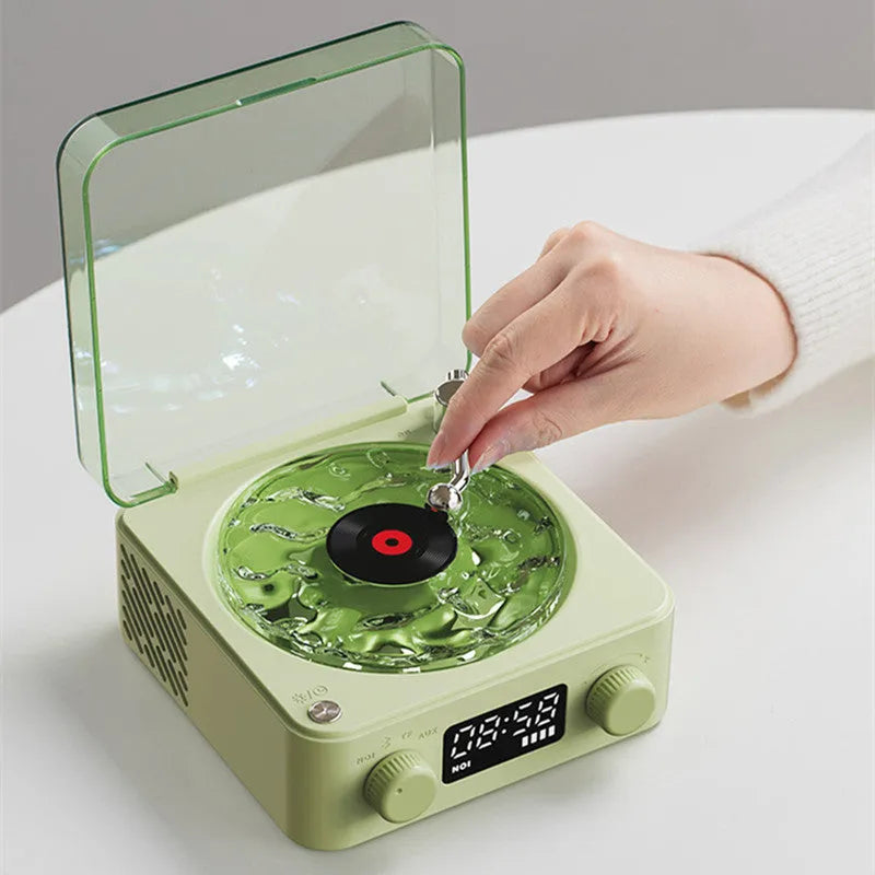 Retro-style Bluetooth speaker with rotating vinyl turntable and RGB coloured lighting effects