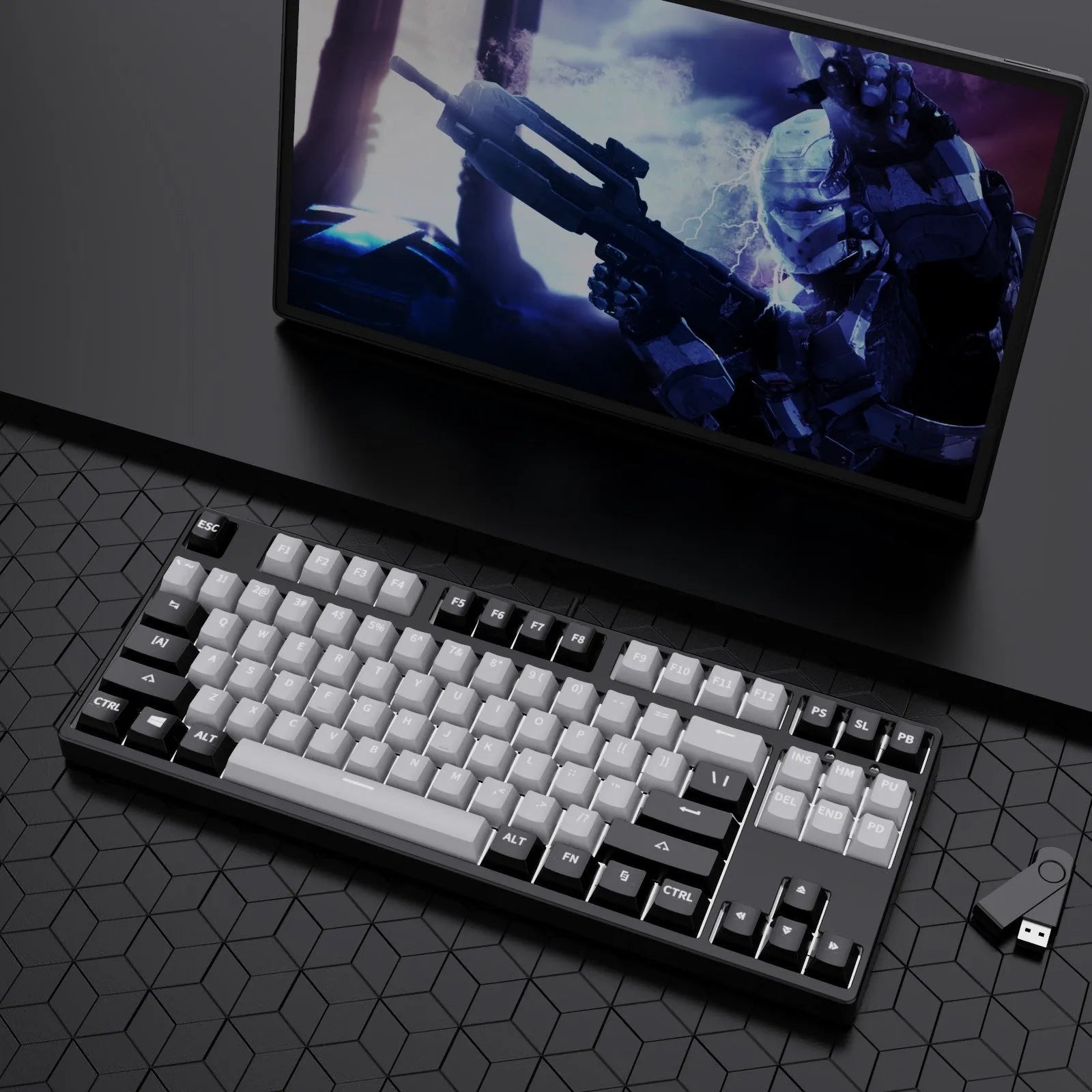 87-key wired mechanical keyboard with two-tone keycaps and metal frame, showing compact design and included tools