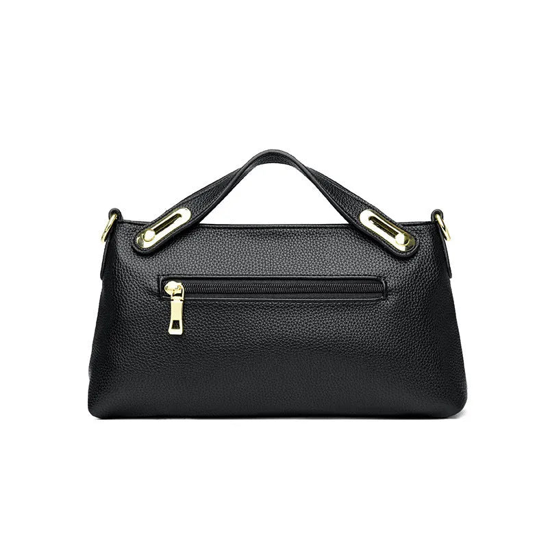 Leather niche pleated shoulder crossbody bag in black with horizontal square shape, multiple interior pockets and soft composite leather.
