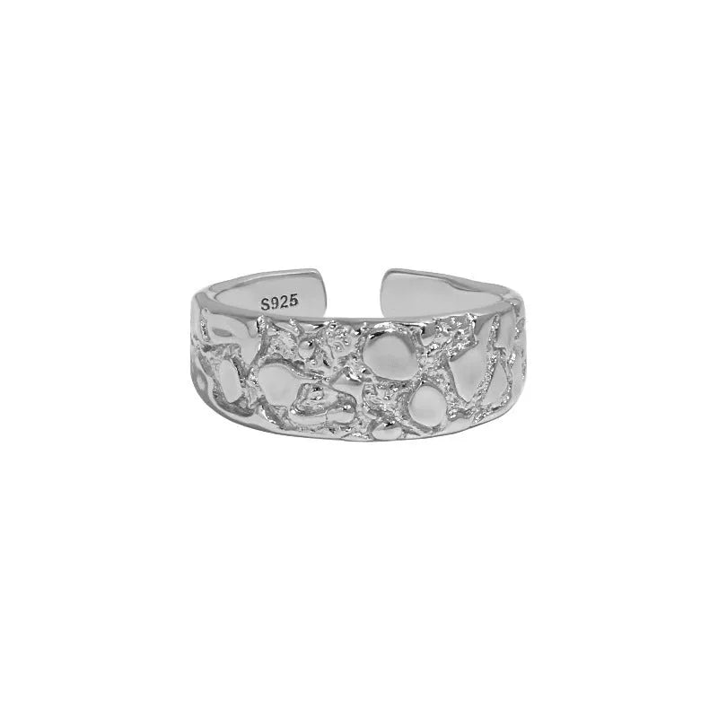 Adjustable opening silver ring with hammered texture in white gold colour finish