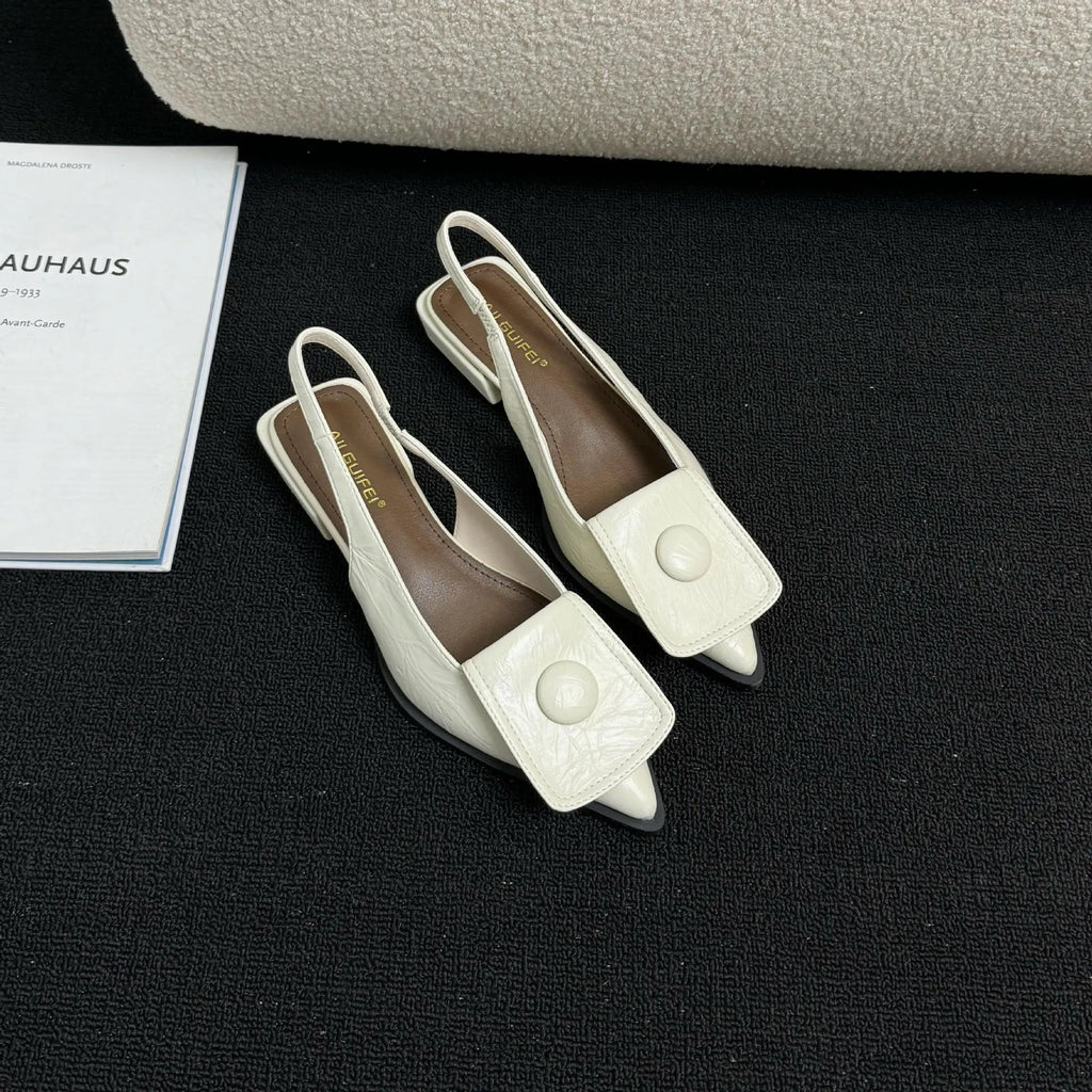 Women's low heel sandals with pointed closed toe and back strap in apricot colour