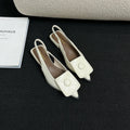Women's low heel sandals with pointed closed toe and back strap in apricot colour