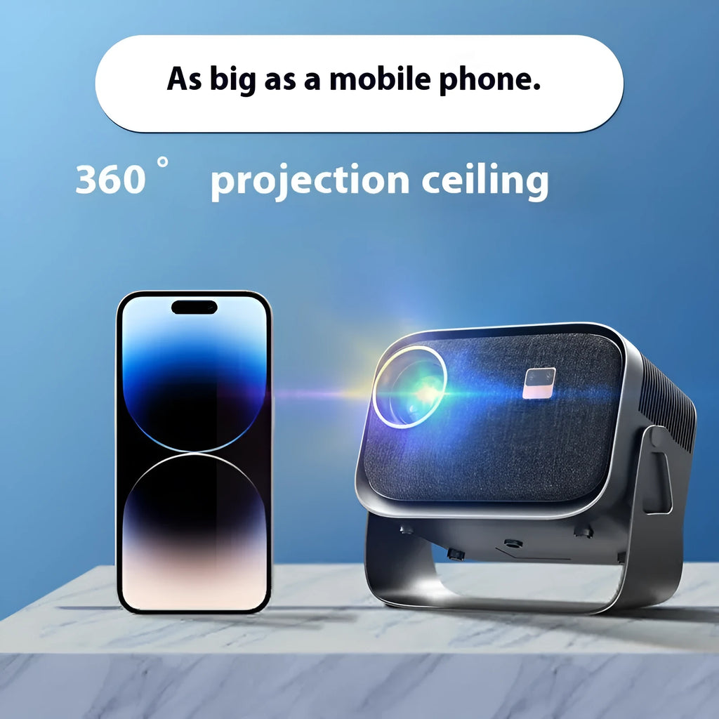 Portable Android 4K Full HD home projector with mobile phone on a table.