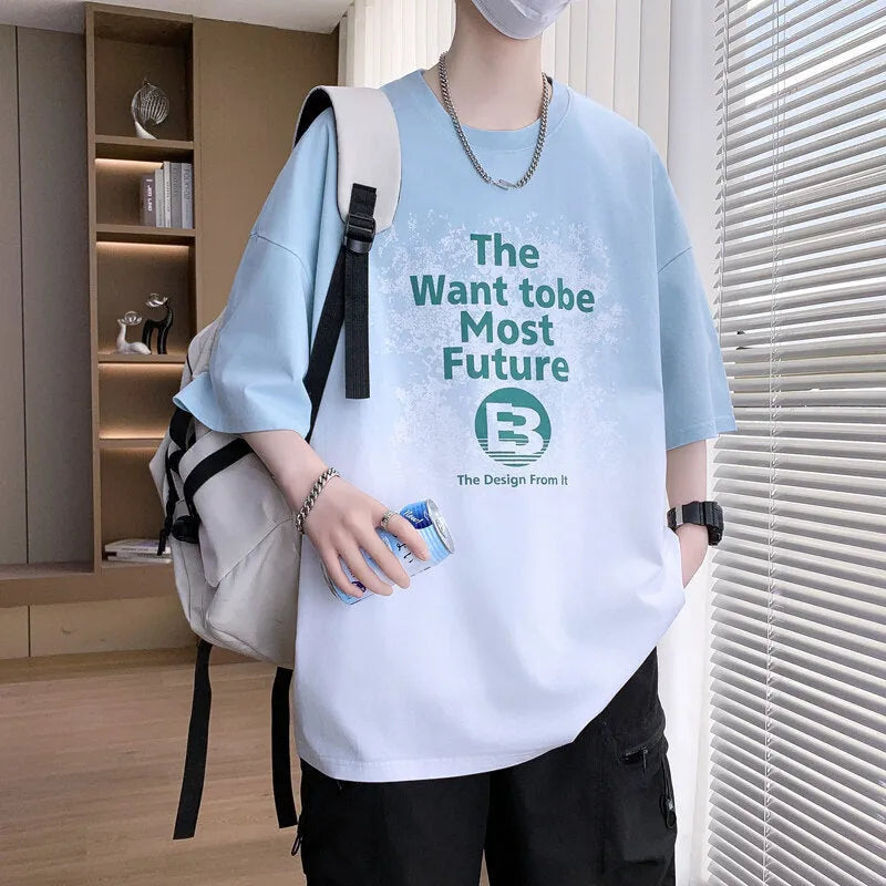 A dark blue boys' printed t-shirt with jacquard text pattern and drop shoulder sleeves.
