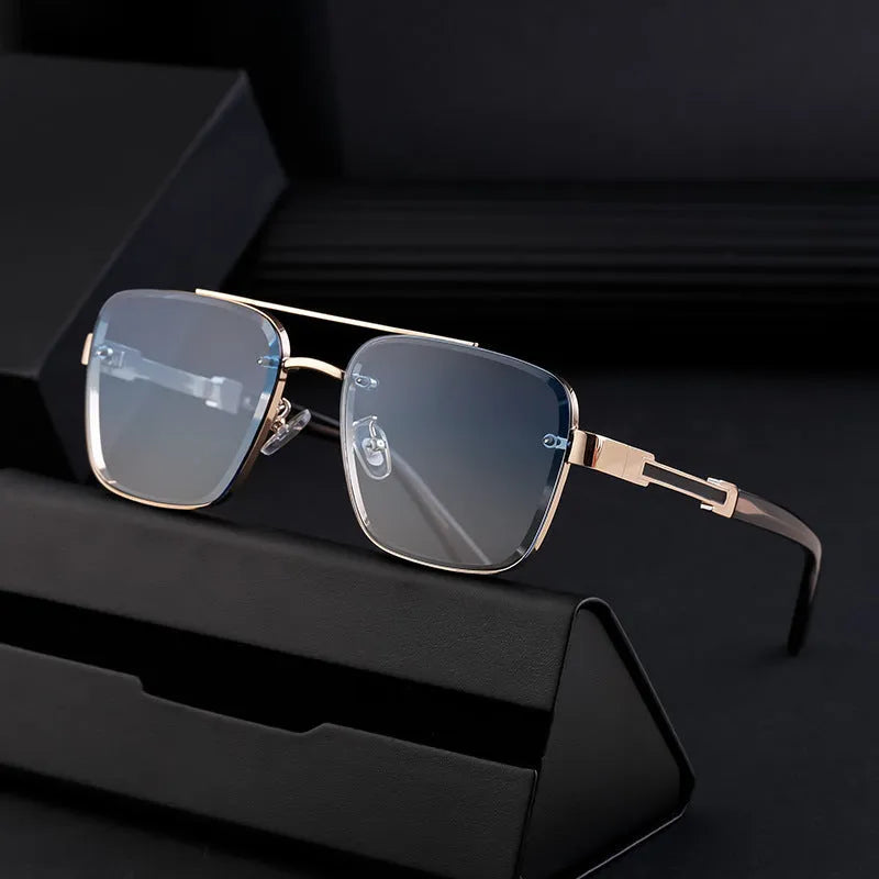 A pair of men's vintage-style sunglasses with UV-protective PC lenses, shown in a gold double gray colour variant.