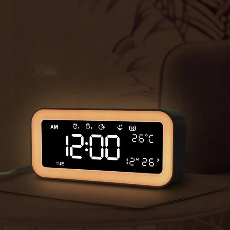 Rectangular LED atmosphere alarm clock in blue or pink with digital display and music function