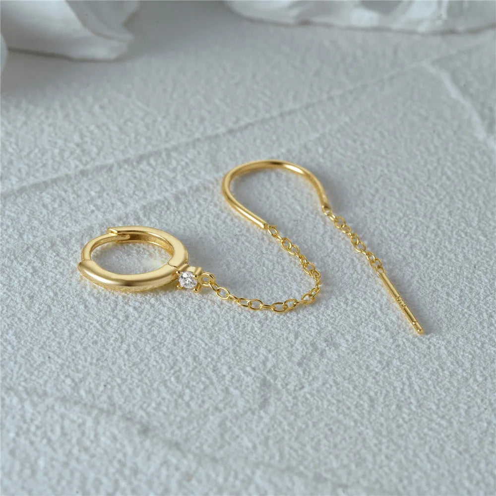 S925 sterling silver earrings with geometric flower tassel design and golden electroplated finish on ear clip mechanism
