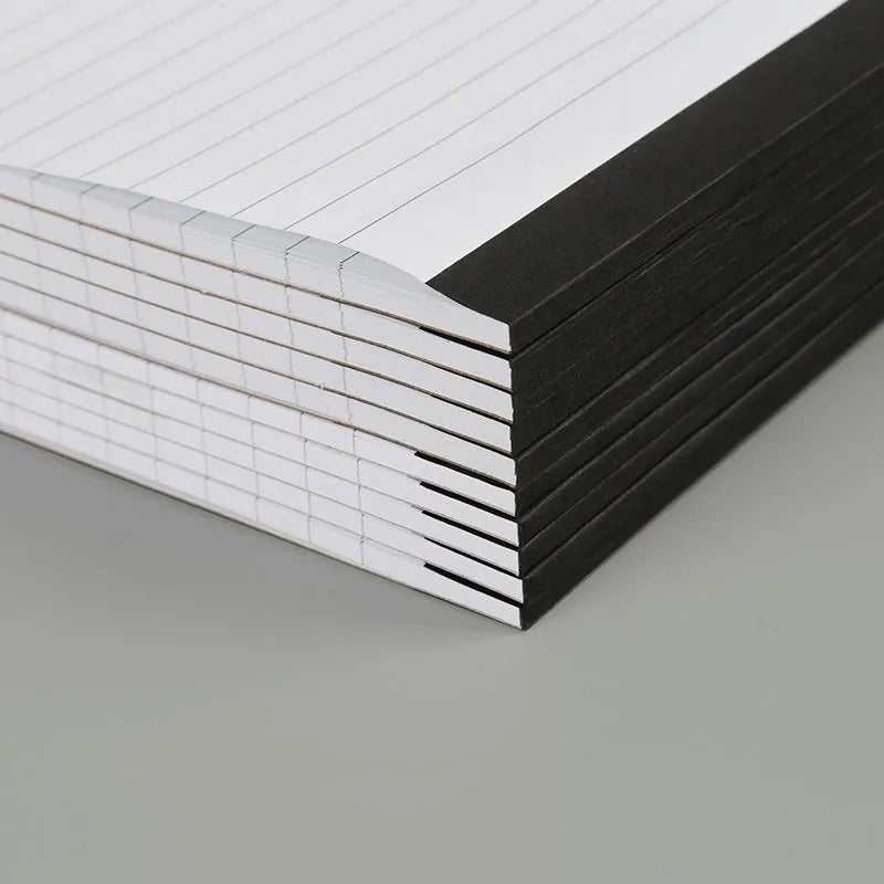 A4 tearable notebook with grid pages and wireless adhesive binding, paper cover