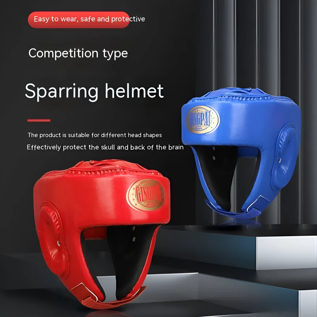 Red fully enclosed boxing helmet with jaw protection showing vertical ventilation design