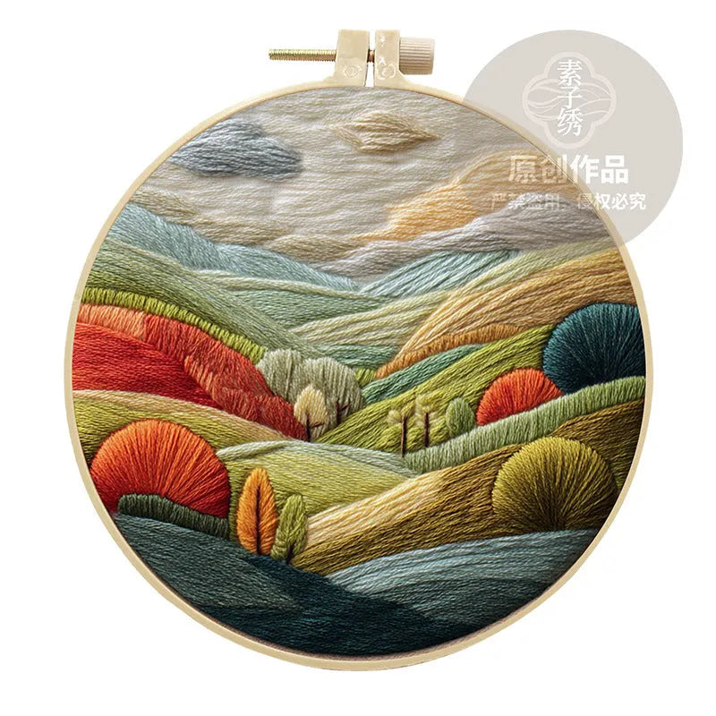 Embroidery DIY landscape kit with bamboo-style frame, pre-printed cotton fabric, embroidery threads, and needles