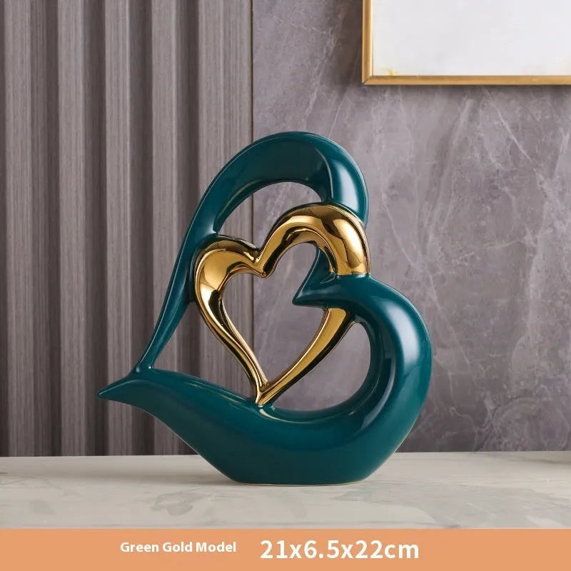 White porcelain love heart ornament with geometric design in metallic finish, approximately 19cm in size