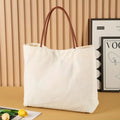 Canvas tote bag with reinforced handles in beige white and white colour options