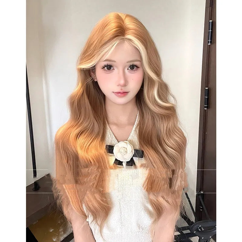 Long curly lace front wig in American highlight gold colour on display