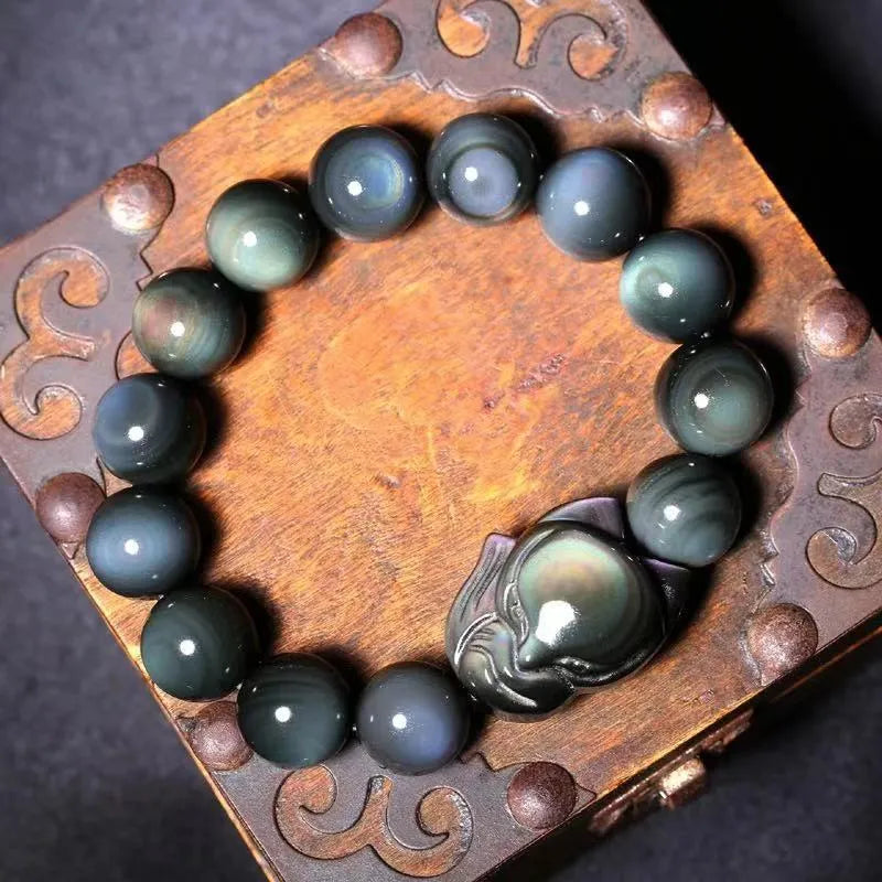 Obsidian fox carved couple bracelet showing animal zodiac design in cartoon style