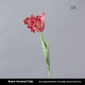 Artificial toothed tulip fake flower arrangement in bright red colour on wooden table