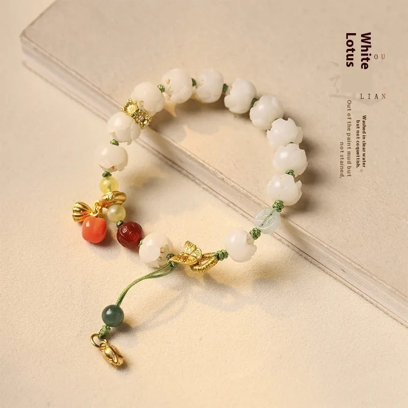Hand-woven white jade Bodhi bracelet with lucky persimmon charm and three bead sizes on open rope