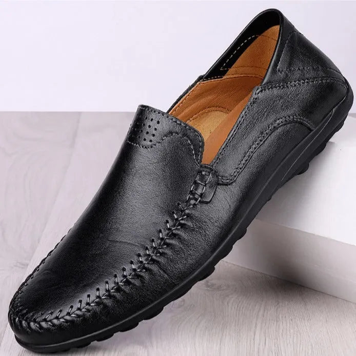 Men's brown leather casual shoes with round toe and flat heel design on rubber sole