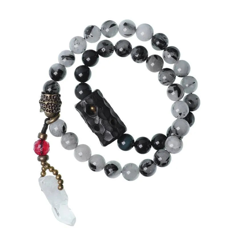 Ethnic black crystal bracelet with white tassels and elastic lacing in four sizes for boys and girls