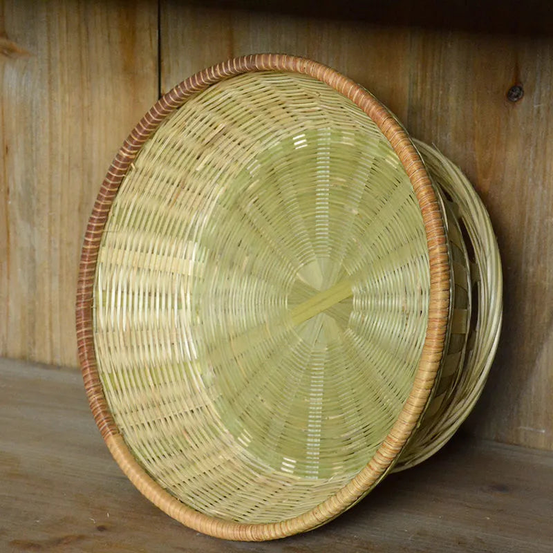 Handmade bamboo storage basket showing woven construction with three size options for household organisation