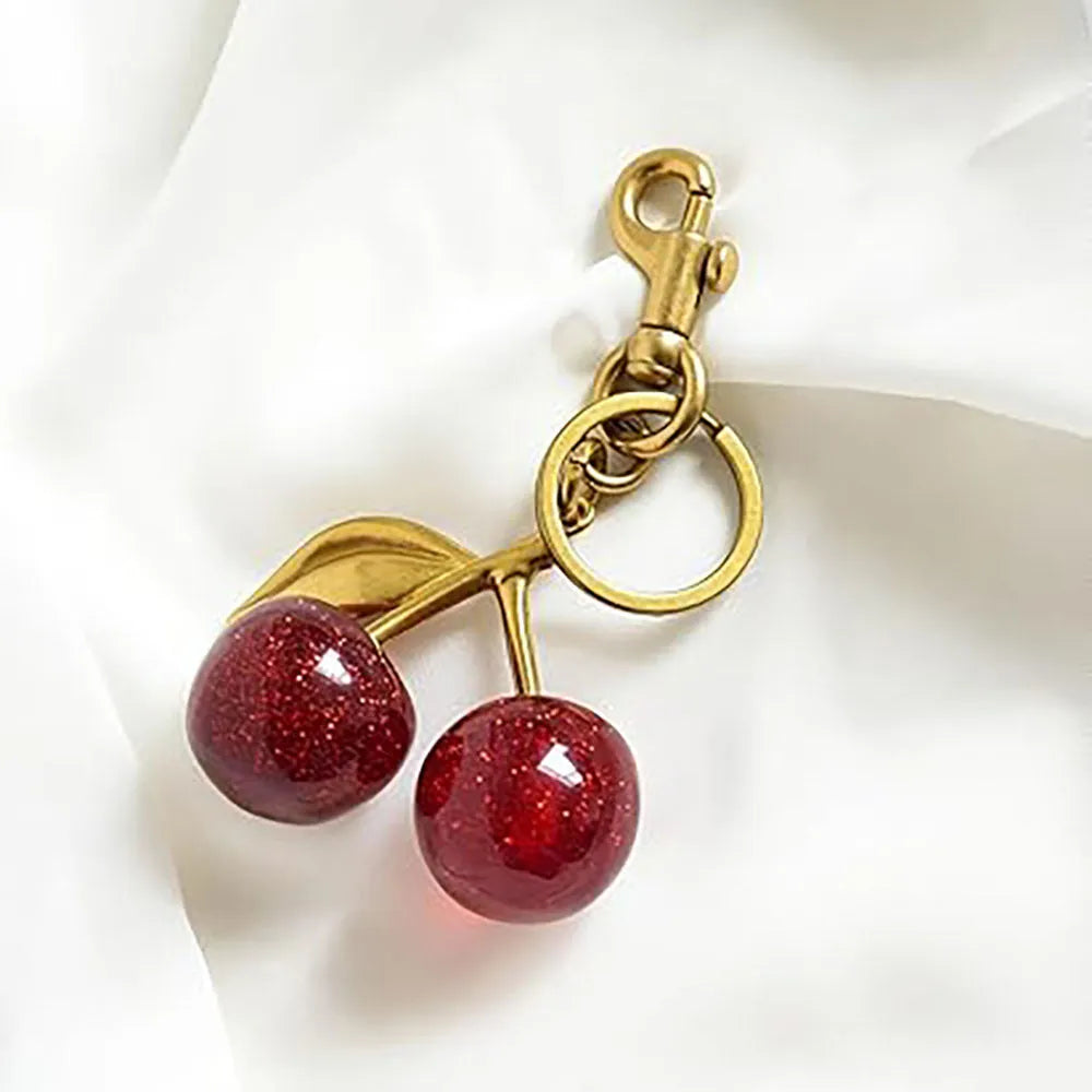 Red zinc alloy cherry pendant key ring with three-dimensional design for women's bags