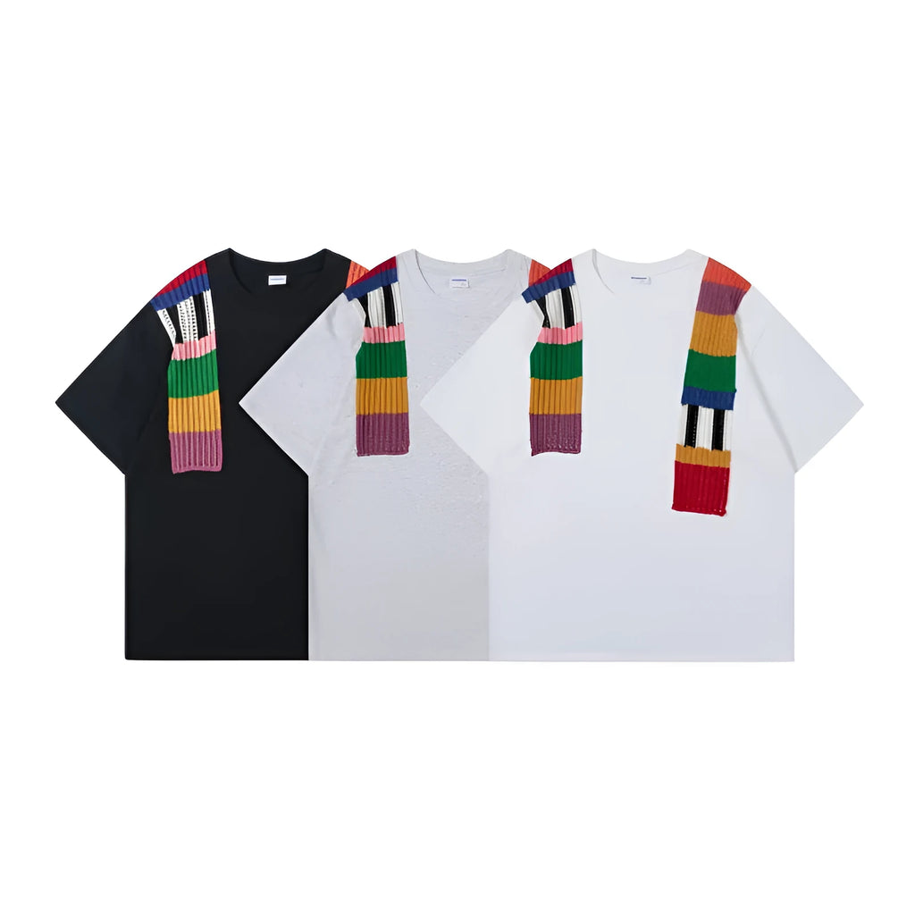 Cotton pullover with patchwork design showing letter patterns in loose fitting short sleeve style