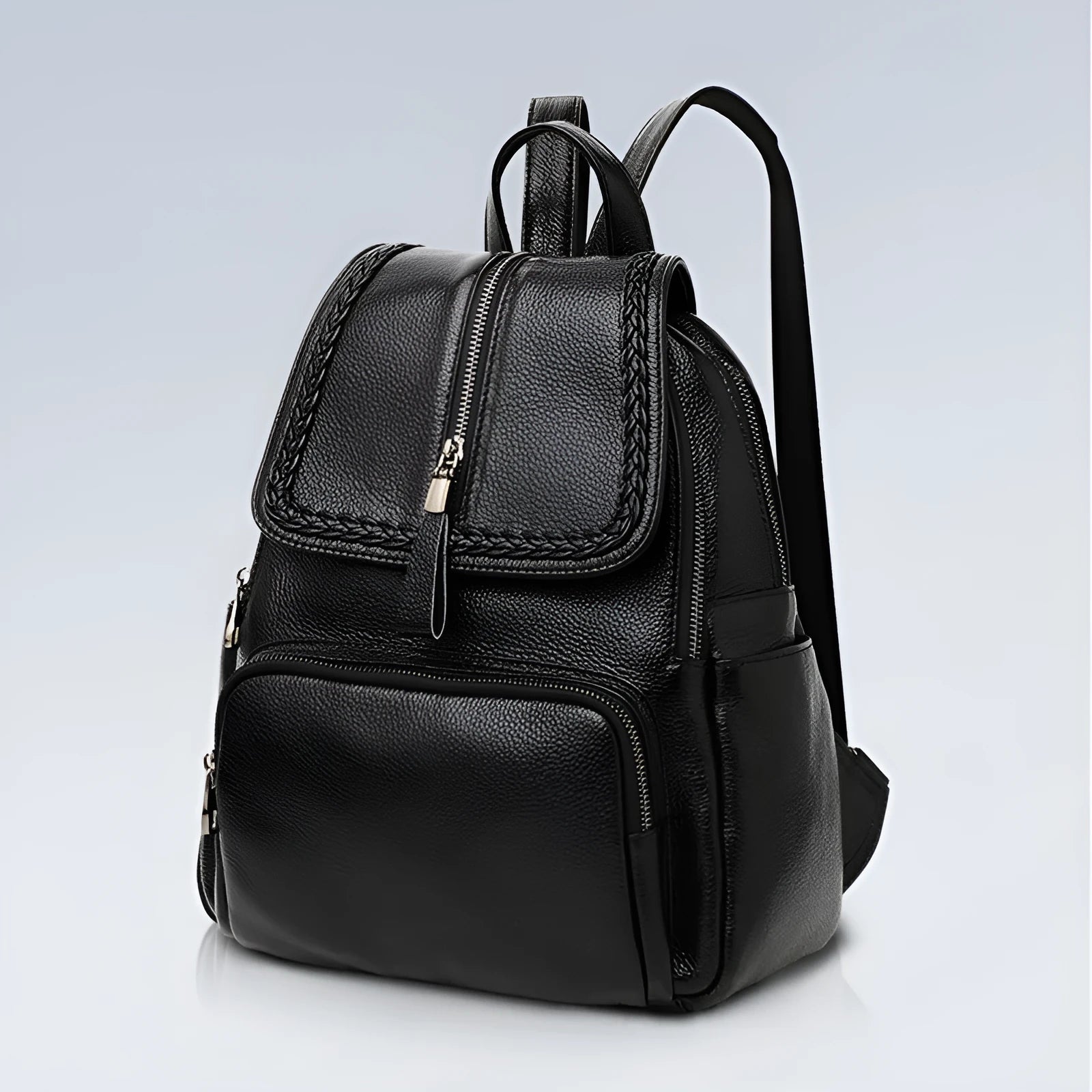 Solid colour genuine leather women's backpack showing blue exterior with multiple compartments and internal organisation